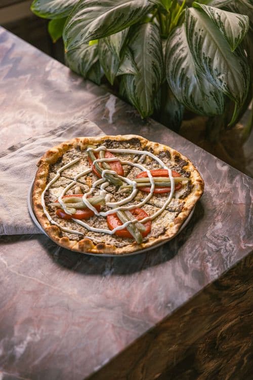 A freshly baked flatbread at Chez Teta Notre-Dame