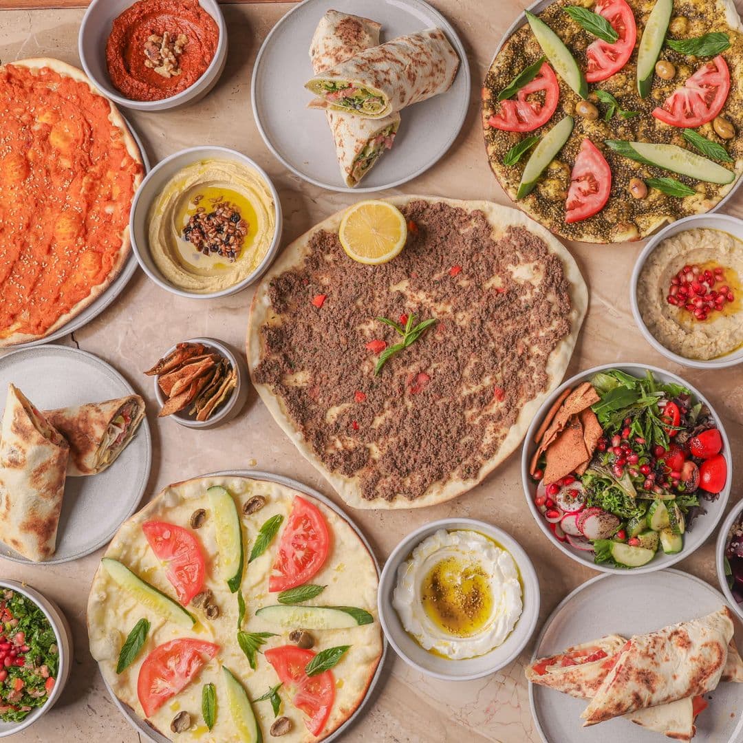A table filled with Lebanese dishes at Chez Teta Plateau